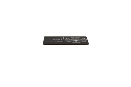 Black business card with white text laying down showing black edge